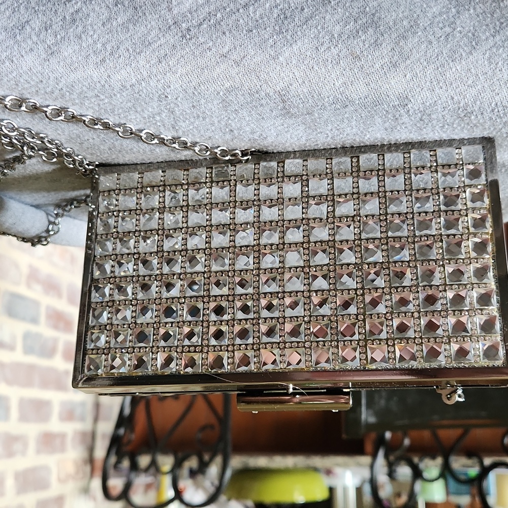 Sparkles purse INC is the brand